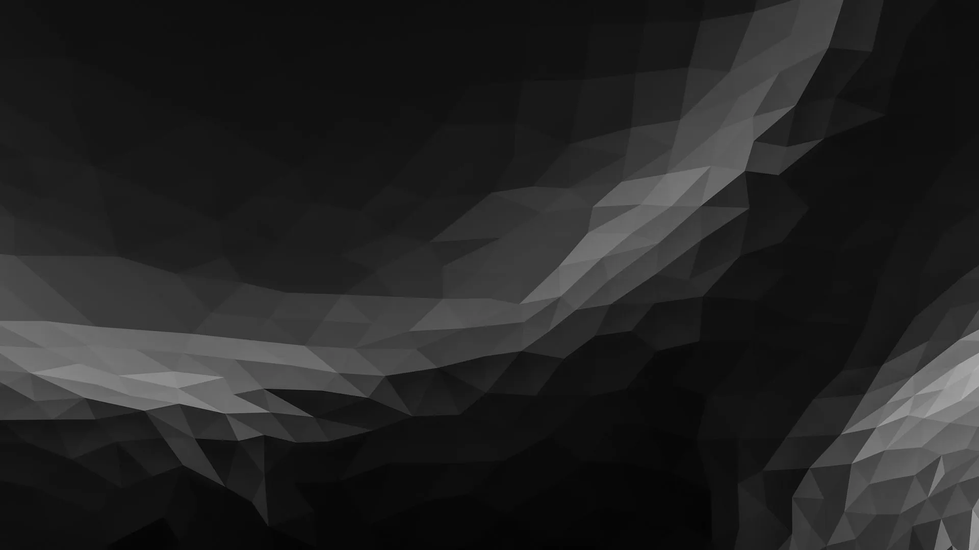 Monochrome geometric abstract background with polygonal shapes creating a 3D effect.